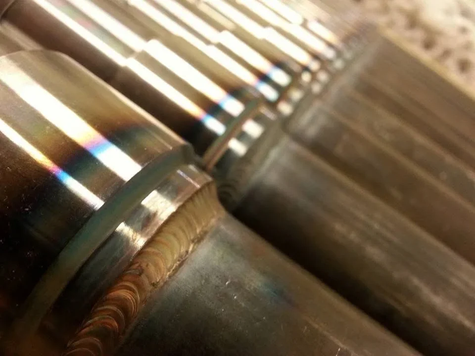 Polished machined shafts with knurled details and precision finishing
